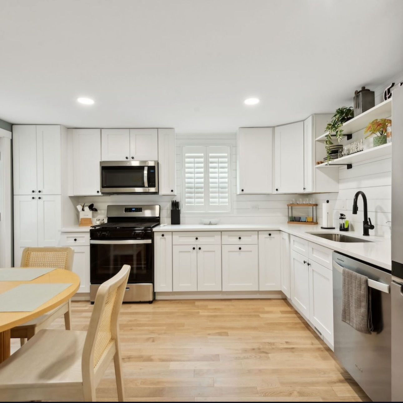 Modern white shaker kitchen remodel with stainless appliances