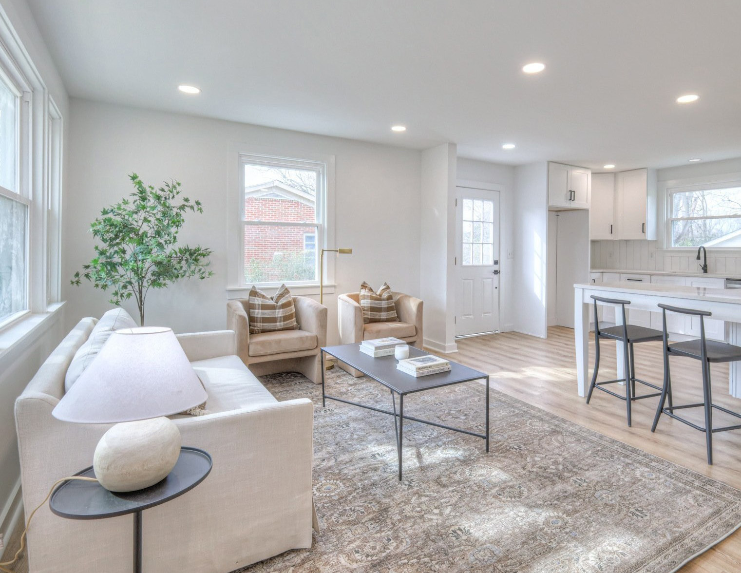 Open concept living space with large windows after renovation, 206 Davidson Drive Franklin TN