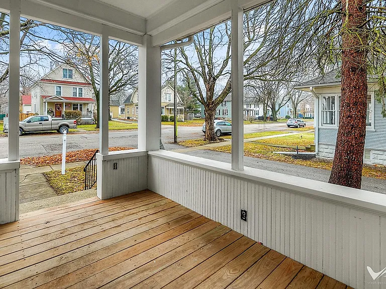 Screened-in porch addition with wood floor for Tennessee outdoor living